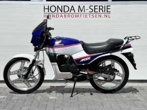 Deels gerestaureerd Zwitserse Honda MBX50 SW LC Rothmans Blauw